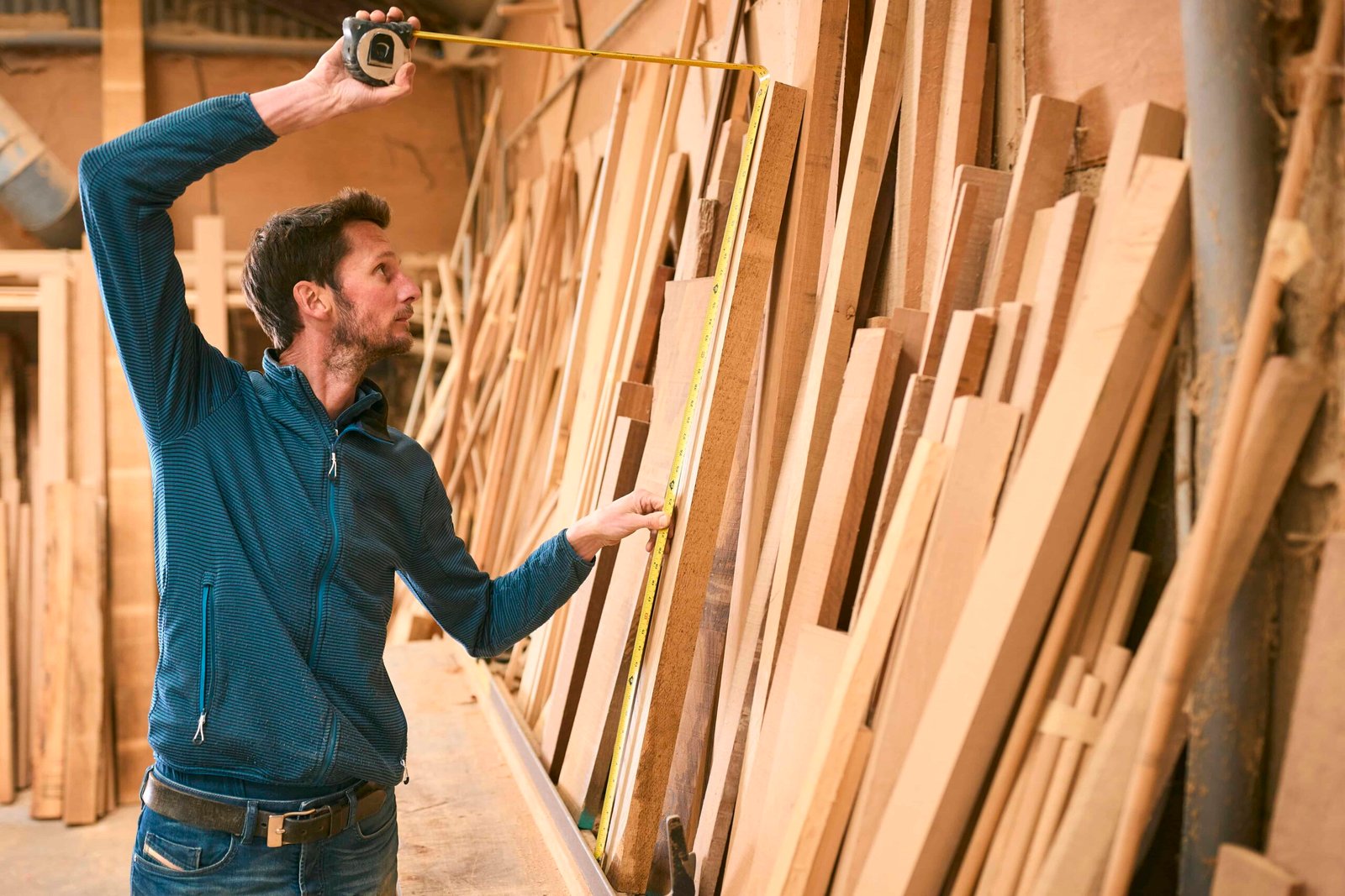 carpenter-working-in-woodwork-workshop-measuring-w-2024-10-19-10-06-22-utc